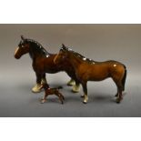 A Beswick brown glass horse; a brown glass foal;