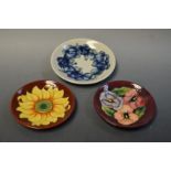 Moorcroft - a sunflowers dish;  another pansy;  another blue pansy,