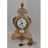 A late 19th century onyx and gilt metal  mantel clock