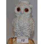 A late 19th century continental Owl lamp base, glass eyes, c.