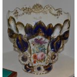 A substantial Continental porcelain vase, stylistically modeled as a blossoming flower,