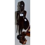 Tribal Art - a carved hardwood tribal figure;