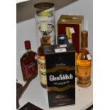 Spirits - a Bowmore single malt whisky, a Glenmorangie whisky, a Glenfiddich whisky,