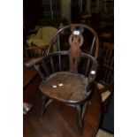 A 19th century beech child's Windsor chair,