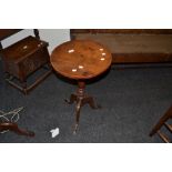 A 19th century oak occasional table, circular top, turned column, tripod legs,