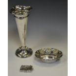 A silver trumpet shaped  vase;  an Edwardian silver Art Nouveau bon bon dish,