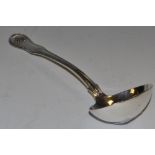 A silver Queens pattern sauce ladle