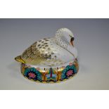 A Royal Crown Derby paperweight, Swan,  printed mark, gold stopper,