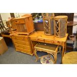 A late 20th century pine chest of four long drawers; a pine dressing dressing table;