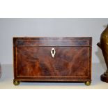 A 19th century mahogany rectangular tea caddy, boxwood strung, ivory lozenge escutcheon,