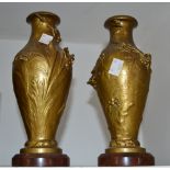 A pair of Aesthetic Movement bronzed vases, cast with flowering blossom and stylised leaves ,