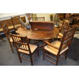 A 20th Century oak gateleg dining table;