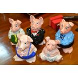 A family of five Wade Nat West pig money banks, comp Sir Nathaniel, Mother, Woody, Annabel and baby,