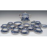 A Newhall tea service, each printed in blue in the chinoserie manner, gilt line rims,