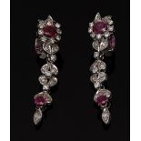 A pair of ruby and diamond earrings,