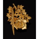 A contemporary gilded metal Rose & Dagger brooch, bearing the signature Rene Magritte,