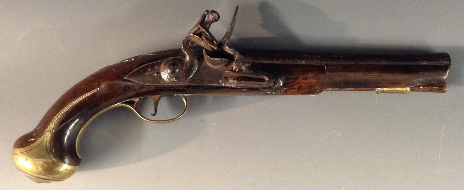 A George III flintlock pistol, 20.