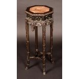 A Chinese hardwood octagonal jardiniere stand,