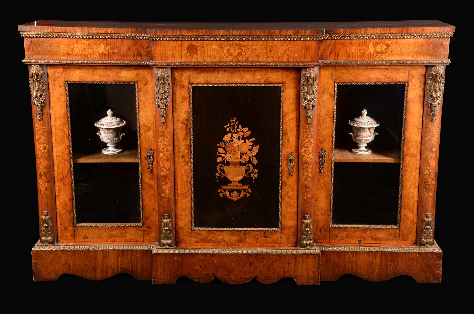 A Victorian gilt metal mounted walnut and marquetry breakcentre side cabinet,