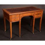 An Edwardian Sheraton Revival mahogany and marquetry desk,