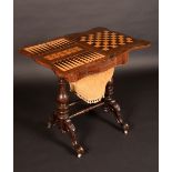 A Victorian walnut serpentine combination games and work table,