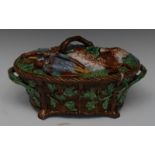 A Minton majolica two-handled game tureen and cover, the cover moulded in relief with hare,