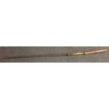 A Malaysian spear, 25cm blade, long ribbed grip, wooden sheath, 142cm long,