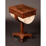 A George IV rosewood rounded rectangular pedestal work table, moulded top above a frieze drawer,