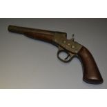 A Remington model 1868 pistol, 15cm barrel, wooden grip,