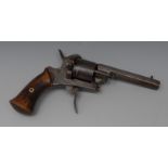 A Belgian six shot rim fire revolver, 19cm sighted barrel, folding trigger, two-piece wooden grip,