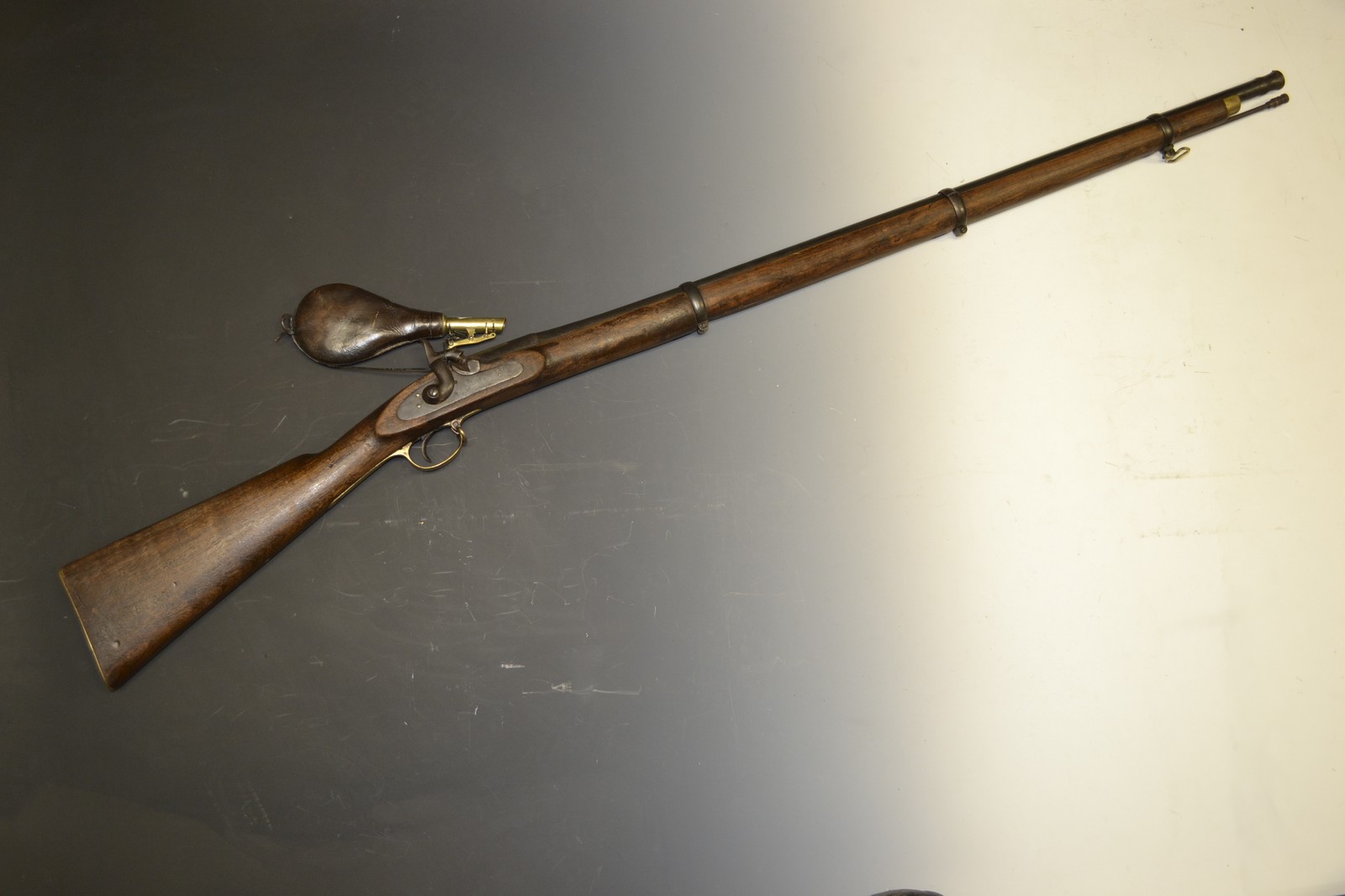 A percussion musket, 102cm barrel with three bands,