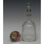 A Victorian James Powell clear glass dimpled decanter, the sides with trailed green glass,