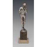 European School, Art Deco, silvered bronze, of nude standing, drinking from a bowl,