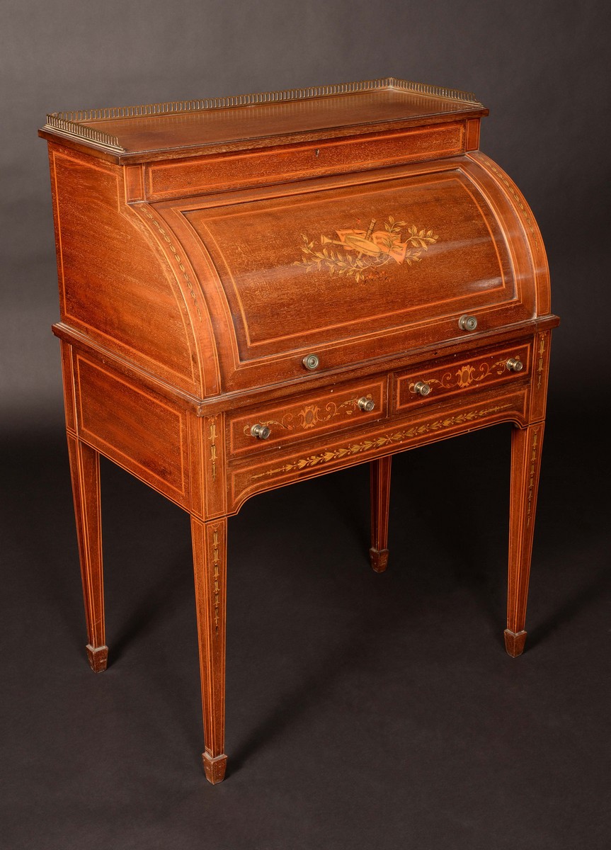 An Edwardian Sheraton Revival mahogany cylinder desk,