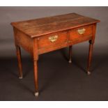 An 18th century oak side table, oversailing rectangular top, two drawers frieze,