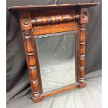 A George IV mahogany pier glass, inverted breakcentre cornice above a rectangular plate,