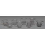 An associated set of five William IV jelly/custard cups, half gadrooned, scroll handles, 6.