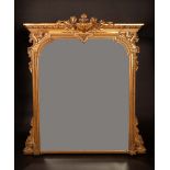 A 19th century giltwood and gesso pier glass, shaped arched bevelled plate,