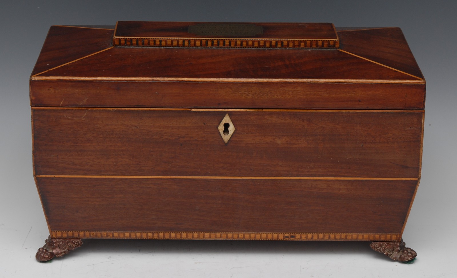 A Regency mahogany sarcophagus tea caddy,