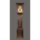 A George II oak longcase clock, 31cm arched brass dial inscribed T.