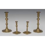 A pair of 18th century brass candlesticks, knopped stems, petal shaped bases, 19.5cm high, c.