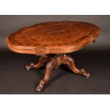 A Victorian walnut and marquetry shaped oval centre table,