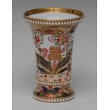 A Spode Imari flared cylindrical vase, decorated with stylised flowers and foliage, beaded border,