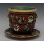 A 19th century majolica jardiniere and stand,