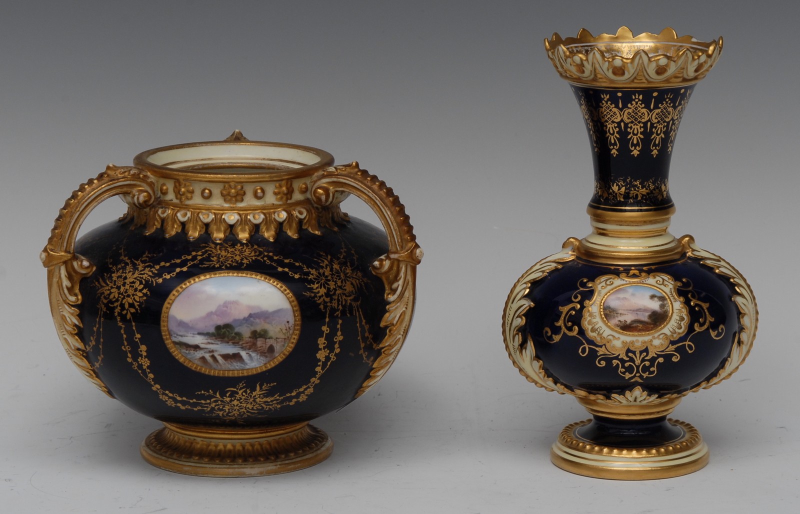 A Coalport vase, with flared neck, painted with landscape within a beaded gilt cartouche,