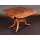 A Regency Egyptian Revival brass mounted mahogany pembroke table,