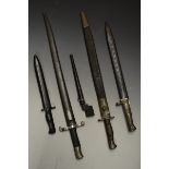 An 1856 pattern and a 1907 pattern bayonet, 43cm fullered blade, two-piece wooden grip,