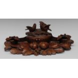 A 19th century Black Forest standish,