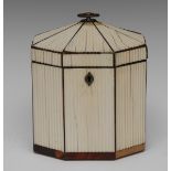 A George III ivory octagonal tea caddy, hinged cover with silvered axehead handle, fluted veneers,