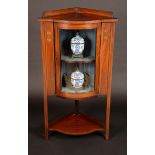 An Edwardian mahogany bow fronted corner display cabinet, shallow gallery,